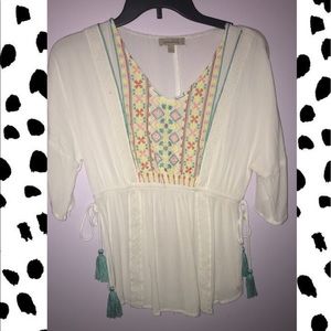 White embroidered blouse with tassels
